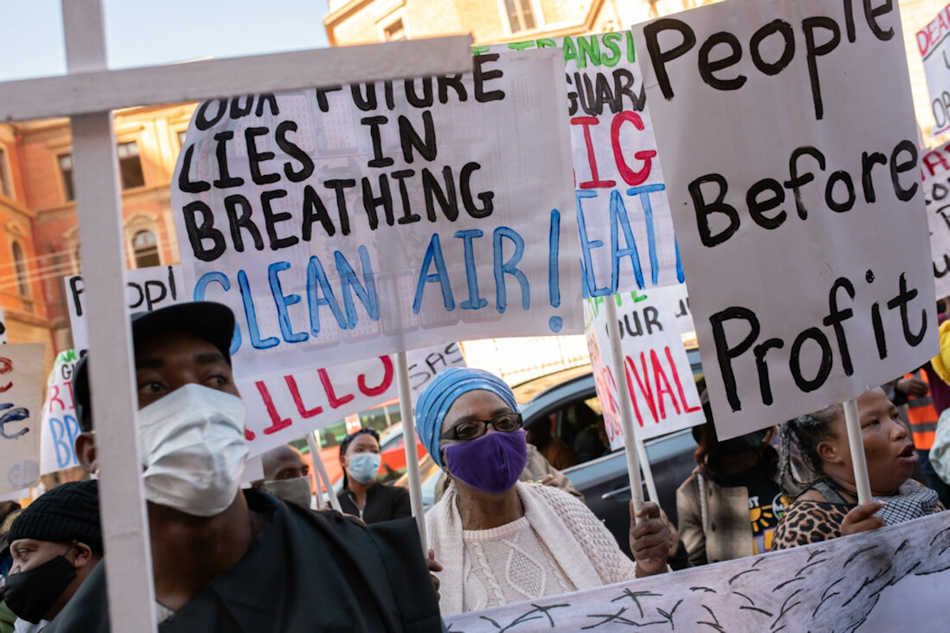 Activists outside Deadly Air hearing in 2021