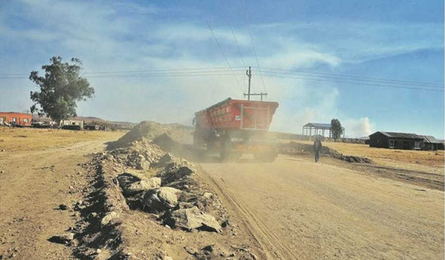 A coal  truck passes through a village in Dannhauser,  Newcastle. Photo: News24